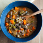 Hearty beef and barley soup with tender beef, carrots, celery, and pearl barley in a rich broth