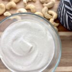 Easy 2-ingredient cashew cream blended until smooth as a dairy-free substitute for heavy cream