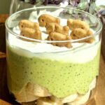 Creamy matcha cheesecake chia pudding with fruit, Greek yogurt topping, and Goldfish® Grahams Cinnamon Roll crackers