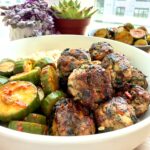 Korean Bulgogi meatballs served in a high-protein bowl with rice and cucumber salad