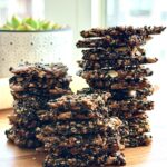Healthy Black Sesame Seed Crackers made with black sesame seeds, pistachios, pumpkin seeds, sunflower seeds, hemp hearts, flaxseed, and chia seeds.
